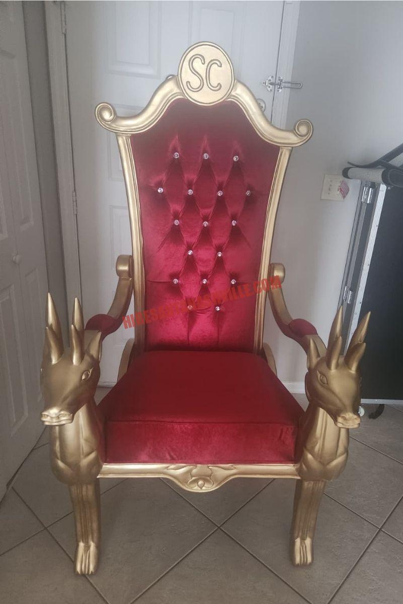 Santa chair photos in Nashville: gold chair with a red tufted back ready for portraits.