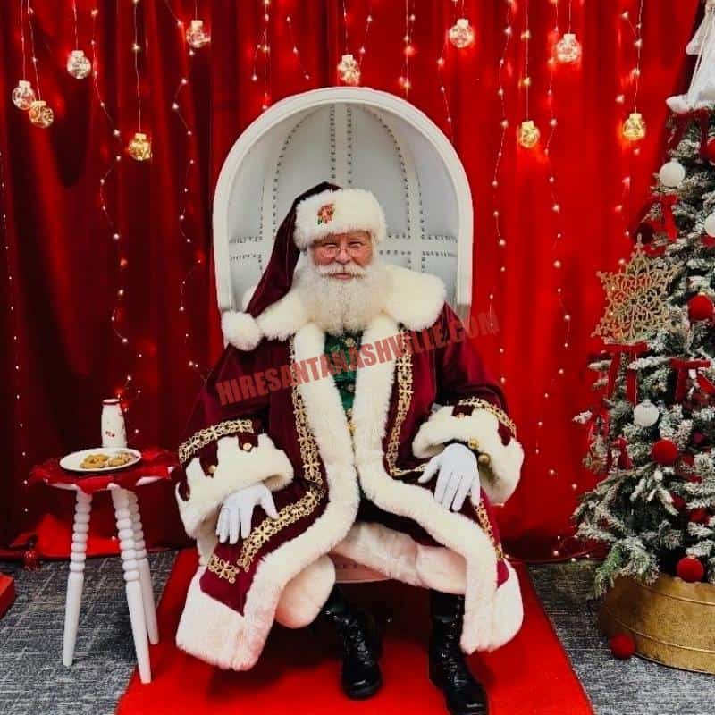 Santa for hire in Franklin, TN: real bearded Santa in a white chair with cookies and milk.